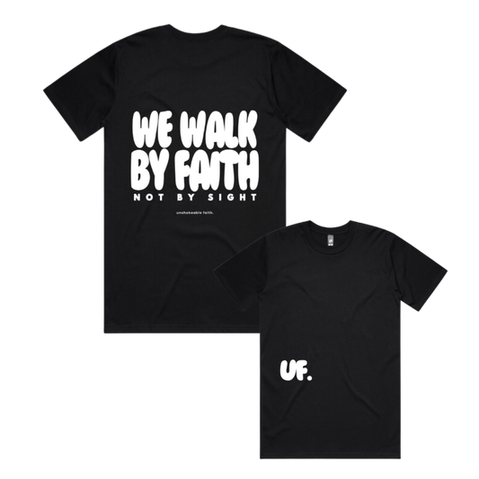 Black t-shirt with 'We Walk by Faith Not by Sight' text on a white background [logo_white]